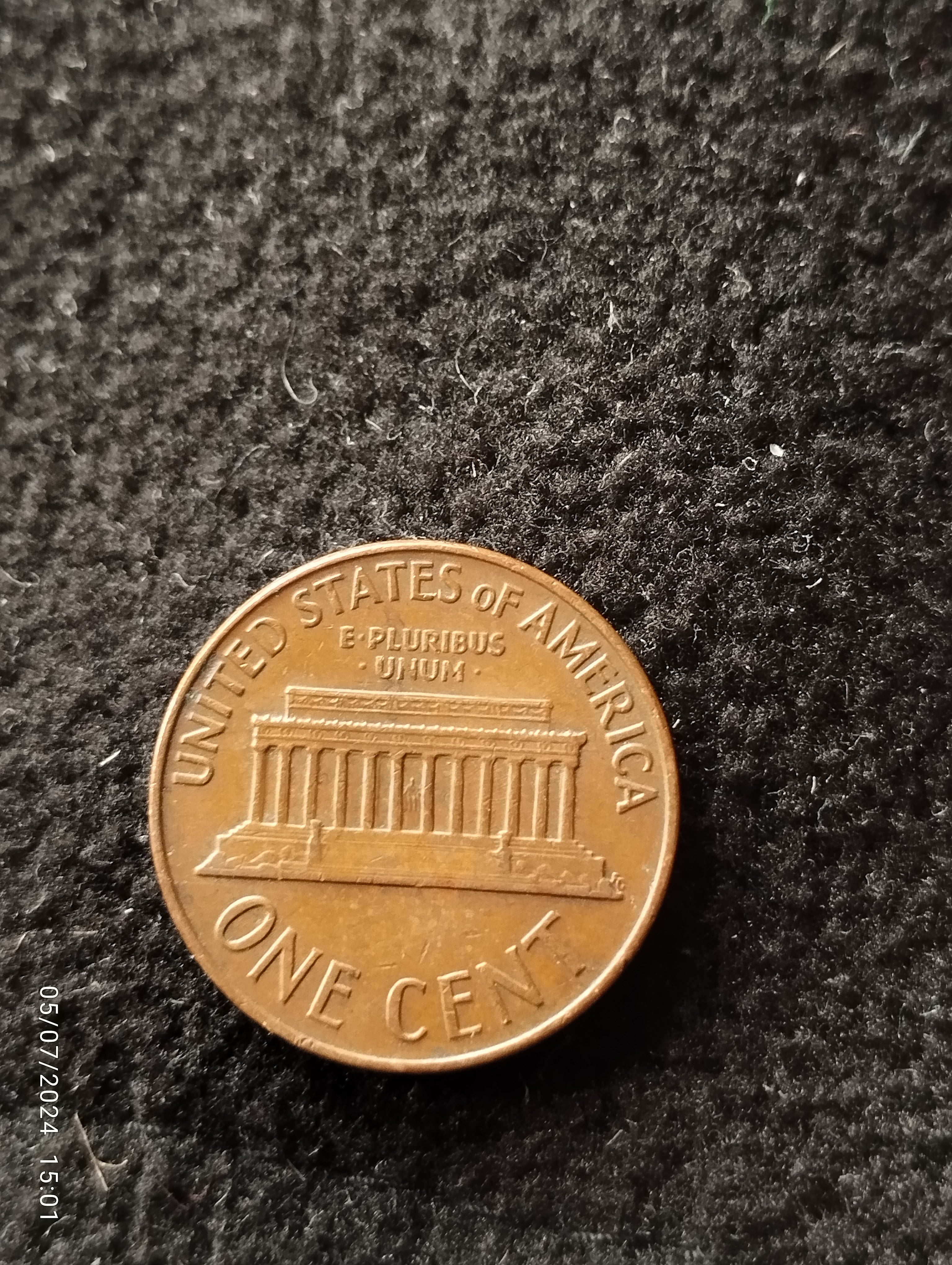 CENTAVO DE DOLLAR AMERICANO -05E